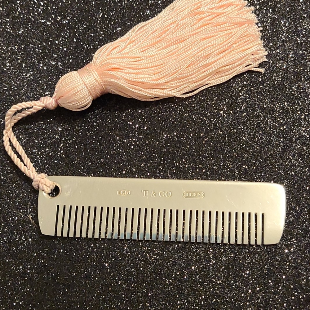 Baby comb with pink tassel with dust bag and box
